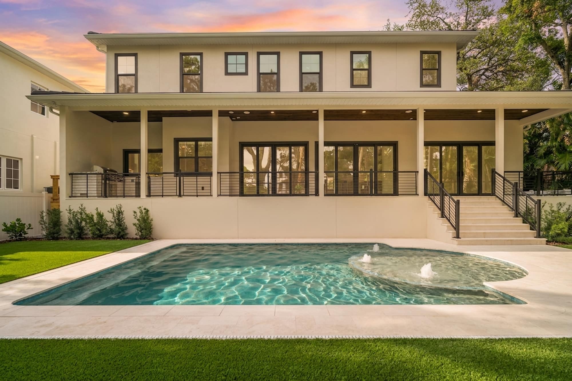 A modern Tampa Bay custom home with an integrated pool built into the developer’s construction schedule by LIV Pools